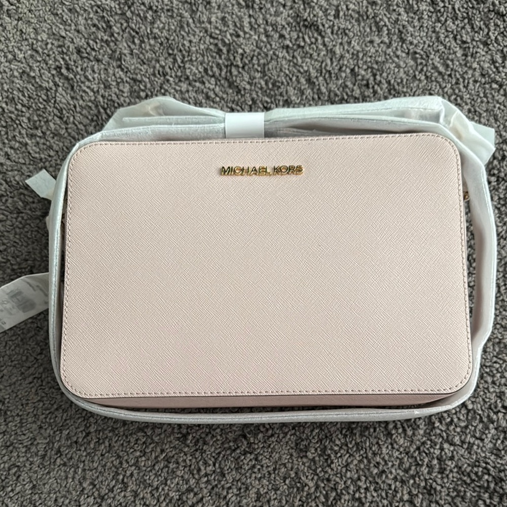 Michael Kors Pink Crossbody Bag with Sleek Design - Picture 1 of 2